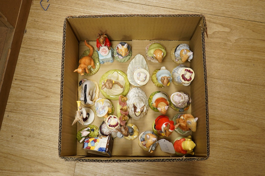 A collection of Royal Doulton figures Beatrix Potter character figures and boxed miniature figures. (2)